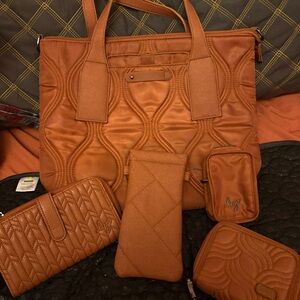 Lug Alto purse and lots of accessories included. Copper Brown